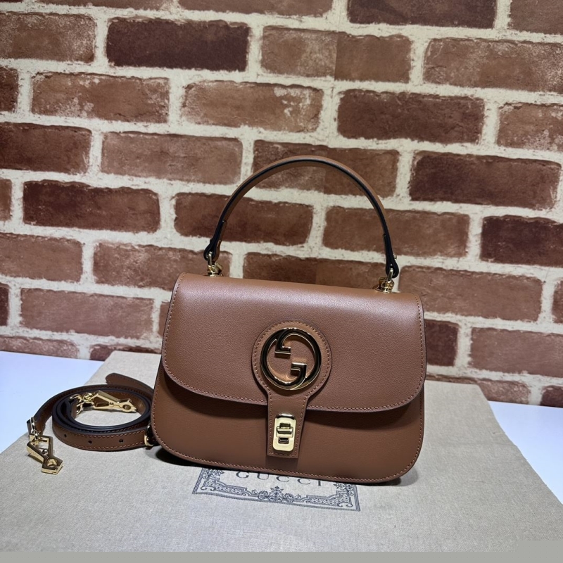 G*u*i top handle bags